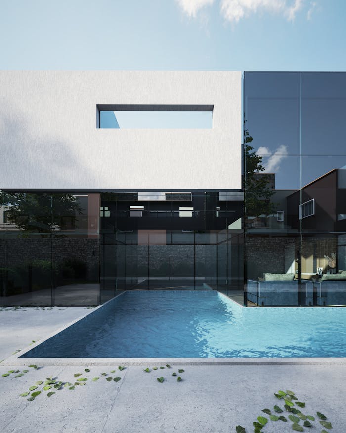 pexels-photo-13203188 3D rendered image of a modern minimalist house with a swimming pool in a bright outdoor setting.